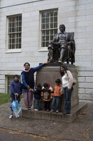 315-0581 Posing with Statue of John Harvard.jpg